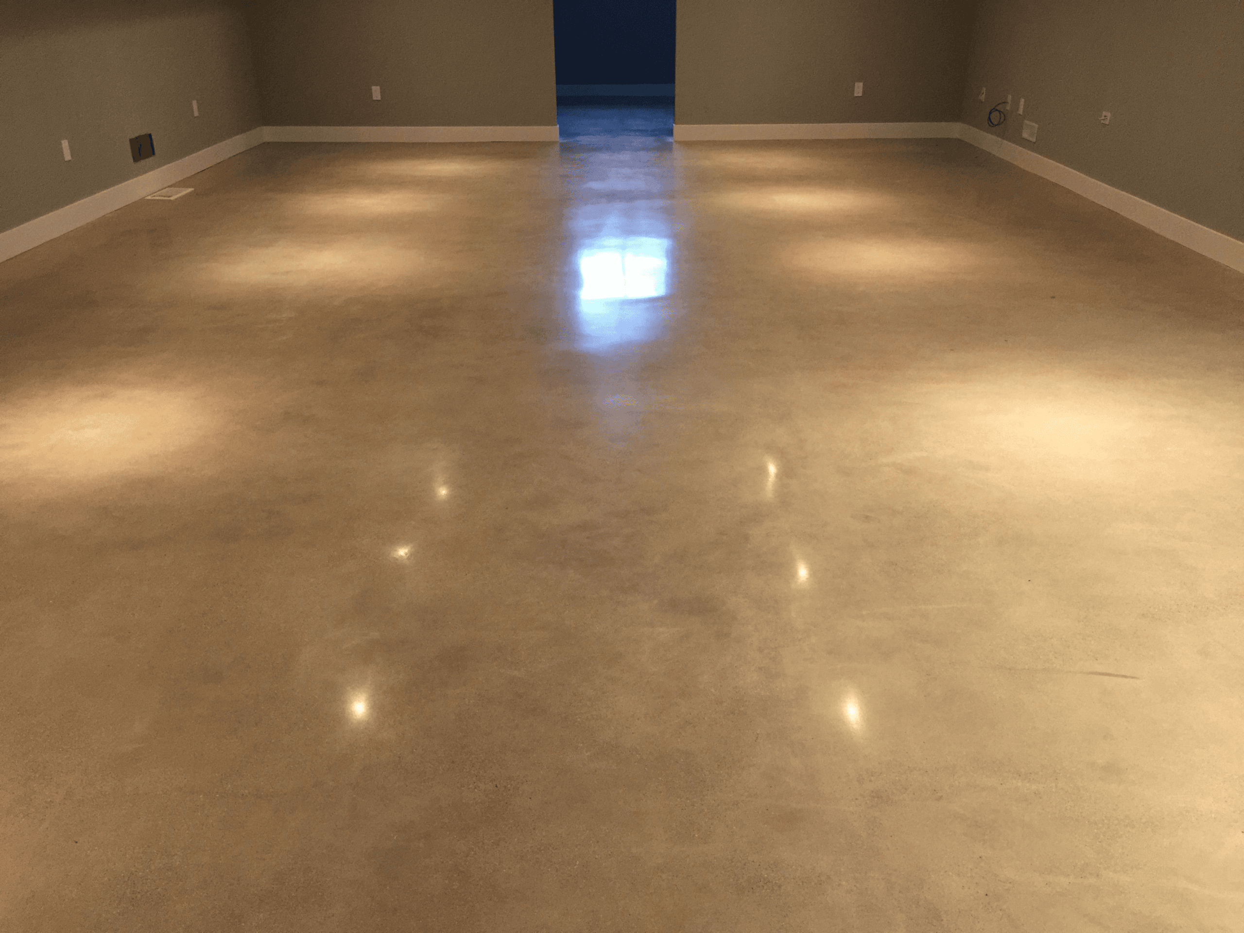 Epoxy floor coating applied in a residential basement in Kitchener, Ontario